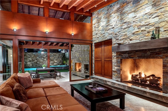 Indoor living with giant fireplace