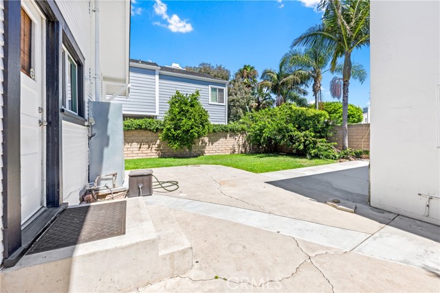 Kitchen back door leads to a wonderful backyard.