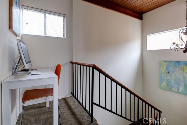 Stairway to second level plus work space nook