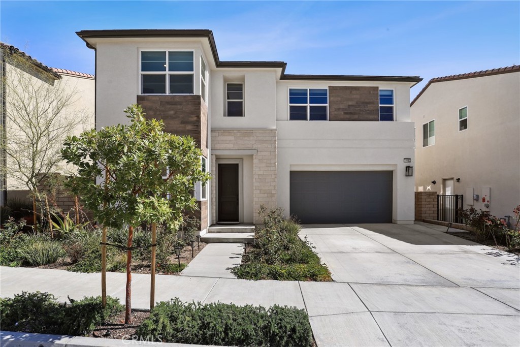 Welcome home to 19152 Blackthorn Dr, a stunning property in the highly desirable gated Skyline Community off Plum Canyon. Built in 2021 by the renowned luxury home builder Toll Brothers, this spacious residence with a modern style exterior is the largest model in the community. With ***No Mello-Roos***, fully paid off SOLAR, and a low HOA fee of just $181, you'll enjoy the peace and security of this exceptional neighborhood.

As you enter, you'll be greeted by a spacious open floor plan filled with natural light from large windows and soaring 10-foot ceilings. On the first floor, you'll find an inviting eat-in kitchen and dining area, a versatile den or bonus room, and a highly desirable first-floor bedroom with a full bath.
The gourmet kitchen is a standout, featuring oversized quartz countertops, ample bar seating, stainless steel appliances, and a spacious pantry. 
Upstairs, the luxurious primary suite has been thoughtfully upgraded and extended over the patio for additional square footage. The spa-like bathroom includes a huge walk-in shower, dual vanities, and a spacious walk-in closet.
The upper level also offers three additional generously sized bedrooms. One guest bedroom features an en-suite bathroom, while the other two share a full bathroom with dual sinks. A spacious loft, currently set up as a workout area, adds flexibility, and a full-size laundry room with a sink.

Outside, the backyard is an entertainer's dream, complete with a fire pit, custom seating, and a California Great Room (covered patio) for year-round enjoyment. Low-maintenance artificial turf, new pavers, and fruit trees.

This home boasts several impressive upgrades, including a 220V electric car charger, a premium lot with no rear neighbors for added privacy, enhanced lighting, and upgraded interior doors. It features one of the largest backyards in the community, while paid-off solar panels and an oversized driveway with ample parking.

The community features a resort-style pool, cabanas, and a BBQ area to enhance your outdoor living.
This home is a rare find and won’t last long. Comparable new construction homes in the area, with similar square footage, are priced higher and lack the benefits of paid-off solar panels, a gated community, and low HOA fees. Call or text us today for a private showing and make this dream home yours before it's gone!