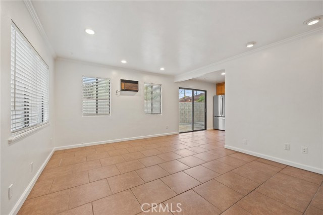 View from front door through living room to Kitchen