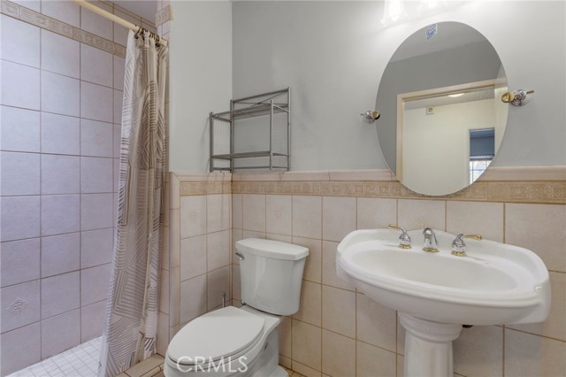 Hallway full bathroom with shower