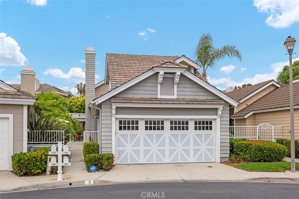 Beautiful detached home in the desirable neighborhood of Beacon Hill Village. Located at the bulb of the Cul de Sac with plenty of guest parking near by, plus a 2 car garage for your private use.  There is a private courtyard enclosed by and entry gate which leads into a large backyard which is great for relaxing or entertaining.  There is a Dutch Style front door which allows you to let in the natural light and the fresh breezes.  The living room has cathedral ceilings and recessed lighting which leads into the kitchen and dining room. The tile flooring covers the downstairs area and is the perfect shade of grey tones. The gas fireplace and large TV mounted above the fireplace can be watched from the kitchen, dining room or living room. The completely upgraded kitchen has Shaker cabinets, raised Subway tile backsplash and stone counters. The kitchen was remodeled with a Bertazzoni stove and other stainless steel appliances. The large kitchen island opens to the dining and living areas and will truly be the centerpiece of your new home. One downstairs bedroom, currently being used as a den and one downstairs bathroom make it ideal for visiting guests. Completely upgraded bathrooms with glass tiles, newer cabinets and stone counters. The backyard is an oasis of its own including a covered arbor for shaded seating. The backyard has mature landscaping and faux grass to make for a low maintenance and visually appealing entertaining space.  The Beacon Hill Village neighborhood has 3 community pools, spas and tennis courts. This home is close to walking trails, shopping and dining. This is California living at its finest!