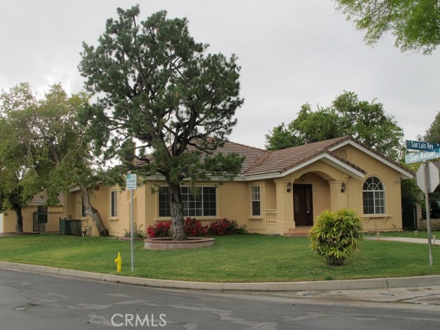 201 San Luis Rey Road Arcadia, California This beautiful single story home was completely renovated in 2001. Nestled in a quiet and tree-lined neighborhood, it has 4 Bedrooms and 3 bathrooms (including 2 suites) plus a den, with a total living space of 3,184 SF. Marble floor at entry and hallway, spacious living room, family room and dining room has shining hardwood floors. Gourmet Kitchen has granite counter top, Kitchen-Aid appliances, over, microwave and built in refrigerator. Two fireplaces are located in the living room and dining room. New carpet in both master suites. Dual A/C provide efficient cooling and heating. Master bathroom has a jacuzzi tub. Laundry room with sink is inside house. Detached two car garage. Good sized backyard and side yard.Walking distance to park. Minutes of drive to Arcadia Mall and Arcadia Old Town. Excellent Arcadia Schools