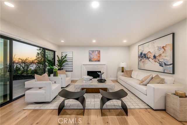 Family room with sleek fireplace.