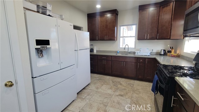 Shared kitchen with two refrigerators