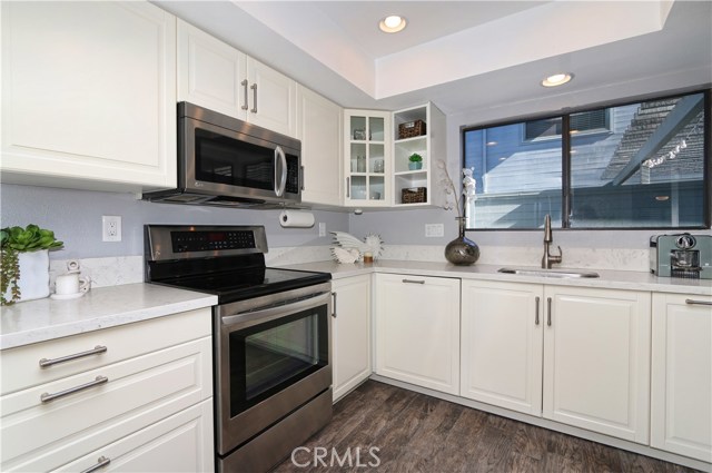 861 America Way Del Mar, California With no one above or below, you will fall in love with this coastal home that has been beautifully updated! There are two full bedrooms, two and a half bathrooms, a full laundry room and a direct access, 2 car garage. The kitchen has been remodeled to perfection, with brand new shaker cabinetry, quartz counters, stainless appliances and recessed lighting. Additional improvements include laminate hardwood floors are throughout the main floor, fresh neutral paint, plantation shutters, designer light fixuresWith no one above or below, you will fall in love with this coastal home that has been beautifully updated! There are two full bedrooms, two and a half bathrooms, a full laundry room and a direct access, 2 car garage. The kitchen has been remodeled to perfection, with brand new shaker cabinetry, quartz counters, stainless appliances and recessed lighting. Additional improvements include laminate hardwood floors are throughout the main floor, fresh neutral paint, plantation shutters, designer light fixures and more! You will have a very large balcony with plenty of space to entertain and barbeque, and exterior string lights for the perfect evening ambiance. With ocean views from the main level and master, you cant beat the location of this home, close to freeway, shops, restaurants and services. Spindrift is a beautifully maintained community and this home is very close to the community pool. Dont miss this coastal chic home!