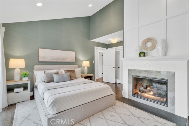 Primary bedroom with cozy fireplace