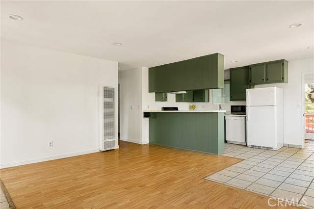 Open dining, living and kitchen.