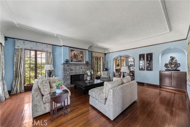 Living room with beautiful inlaid hardwood flooring