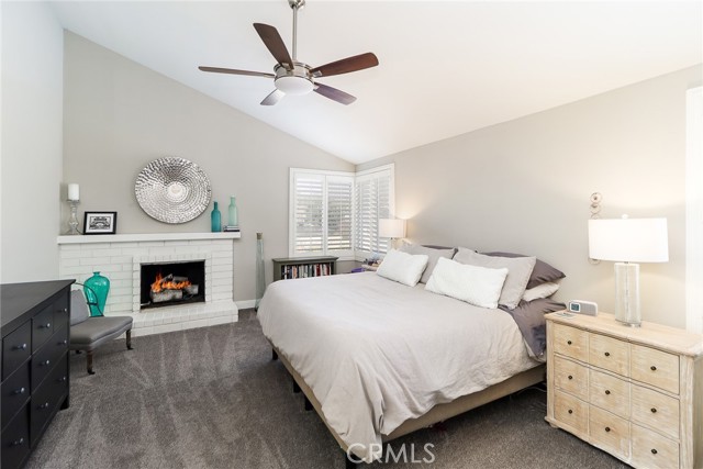 primary bedroom with fireplace