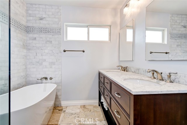 Dual vanities in primary bathroom