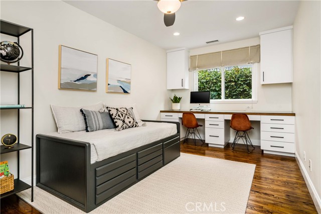bedroom with built-in workspace/ desk