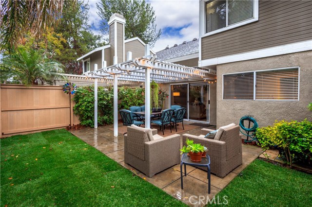 Private and serene backyard provides plenty of seating areas for lounging or entertaining.