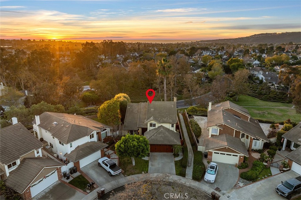 Welcome to this stunning VIEW home perched atop the picturesque Dana Woods. As you step inside this four-bedroom, two and a half bathroom residence, you’ll be welcomed by the perfect combination of Sophistication, Elegance and Luxury. This exceptional property boasts an ideal location at the end of a cul-de-sac with no rear neighbors. As you make your way through the interior, you’ll be enveloped by the home’s high ceilings, energy-efficient windows, solid hardwood floors, custom woodwork and banister, rich textures, and elegant finishes with impeccable attention to detail. The sleek gourmet kitchen is a culinary dream with its Viking oven and stovetop. Four spacious bedrooms are located upstairs. The primary suite exudes a sense of refined luxury, perfect for relaxing as you soak in the tub. The backyard is an entertainer’s dream with a built-in barbeque, extensive landscaping, exterior lighting, and forever sunset views, views, views!! With its prime location, there is a pathway right outside the home that leads to the park, community pool, and woodland trails. You’re also close to Dana Point Harbor’s scenic waterfront which includes upscale dining and boutique shopping.