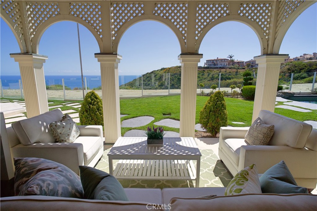 Welcome to 22803 Seaway, where timeless elegance meets unparalleled coastal luxury. Nestled at the tranquil cul-de-sac end of a prestigious guarded gated community in Laguna Niguel, this French-inspired Hampton-style masterpiece is a 2019 Philharmonic House-of-Design Award winner. Embrace spectacular panoramic views of Three Arch Bay, Salt Creek Beach, Catalina Island, and the vast Pacific Ocean from this stunning 6-bedroom, 6-bathroom retreat, set on a sprawling 31,359 sq. ft. lot. Each room is a tranquil sanctuary, with unique ceiling treatments that mimic calming clouds. Indulge in proximity to world-class amenities, just minutes from the Waldorf Hotel, Ritz Carlton, the vibrant Lantern District, and picturesque Dana Point Harbor. For those seeking unmatched opulence and serenity, this is not just a home, but a lifestyle. Experience ultimate sophistication and schedule your private viewing today.