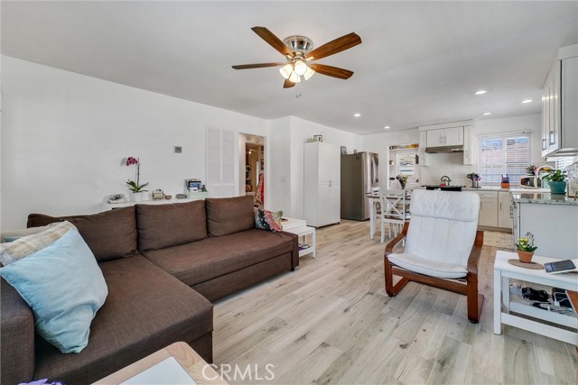 Living Room. Newer dual vinyl windows, ceiling fans, upgraded flooring, cordless blinds