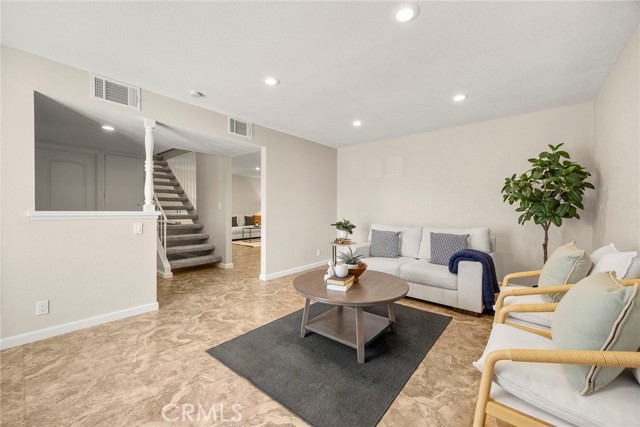 Tile flooring throughout the home looks warm and easy to maintain.