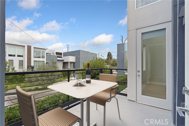 Patio off of living room and bedroom. Virtually staged.