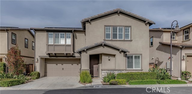 Immaculate 4 bedroom, 3 bathroom home located within the tranquil 33-unit Compass Walk Community of Placentia. Built in 2014, this home has an incredibly spacious floorplan with a ground-level bedroom and bathroom, ideal for multi-generational living. HOA maintained grounds are well manicured with a picnic area. Enter the home and be met by the main floor bed, bath, as well as open concept kitchen and living area. Recessed lighting, upgraded flooring, and central HVAC flow throughout. The roomy kitchen offers upgraded Maple cabinets, Cesar counters, and a walk-in pantry closet equipped with shelves. Enjoy breakfast on the kitchen island's coffee bar or at the adjoining dining area. Stainless steel gas range, dishwasher, and microwave are offered in the kitchen. The dining area patio slider provides access to the cozy backyard showcasing a greenbelt, mature trees, and a paved area - perfect for some outdoor furniture. Second level presents carpet flooring, an amazing loft area, the master suite, hallway bath, and 2 additional bedrooms. Turn the loft into a game room, office, or at home gym. The laundry room, a walk-in storage closet, and linen cabinets are also featured upstairs. Open the plantation shutters and allow natural light to brighten the entire 2nd level. The master suite is great in space complete with an entertainment niche and private en suite. The en suite consists of a walk-in closet with organizers, a soaking tub, and a walk-in shower. Dual vanities and privacy toilet doors can be found in both the en suite and the hallway bath. Other great features of the home include a water softner and owned solar. Surrounded by Black Gold Golf Course, Redwood Grove, Rimcrest Trail Head, and Carbon Canyon Regional Park, ideal area for anyone that loves the outdoors. Prime location means you are only a few minutes away from the Brea Mall, Downtown Brea, Edwards Cinema, Downtown Fullerton, Mother's Market, 57 FWY, and much more!