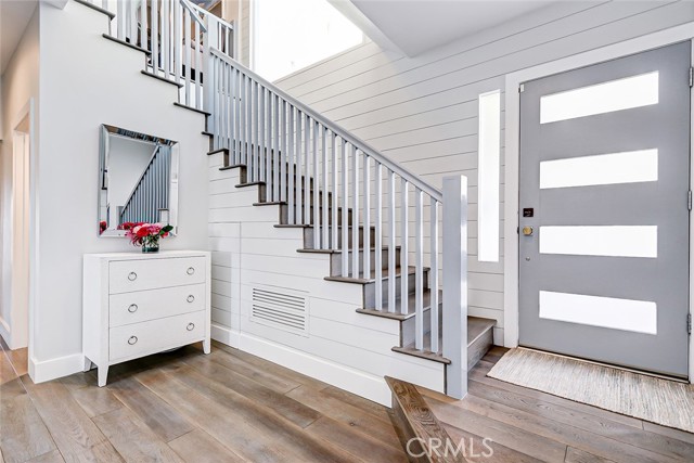 Inside that gorgeous front door is a sun drenched foyer.