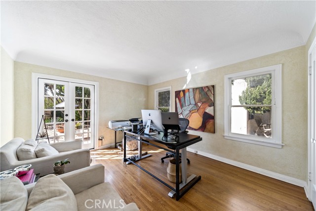 French doors lead to the backyard.