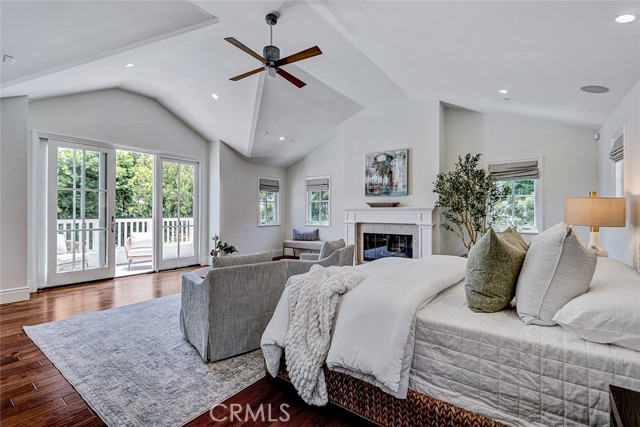 2nd Floor #6 Primary Suite Bedroom with French Doors to Private Deck