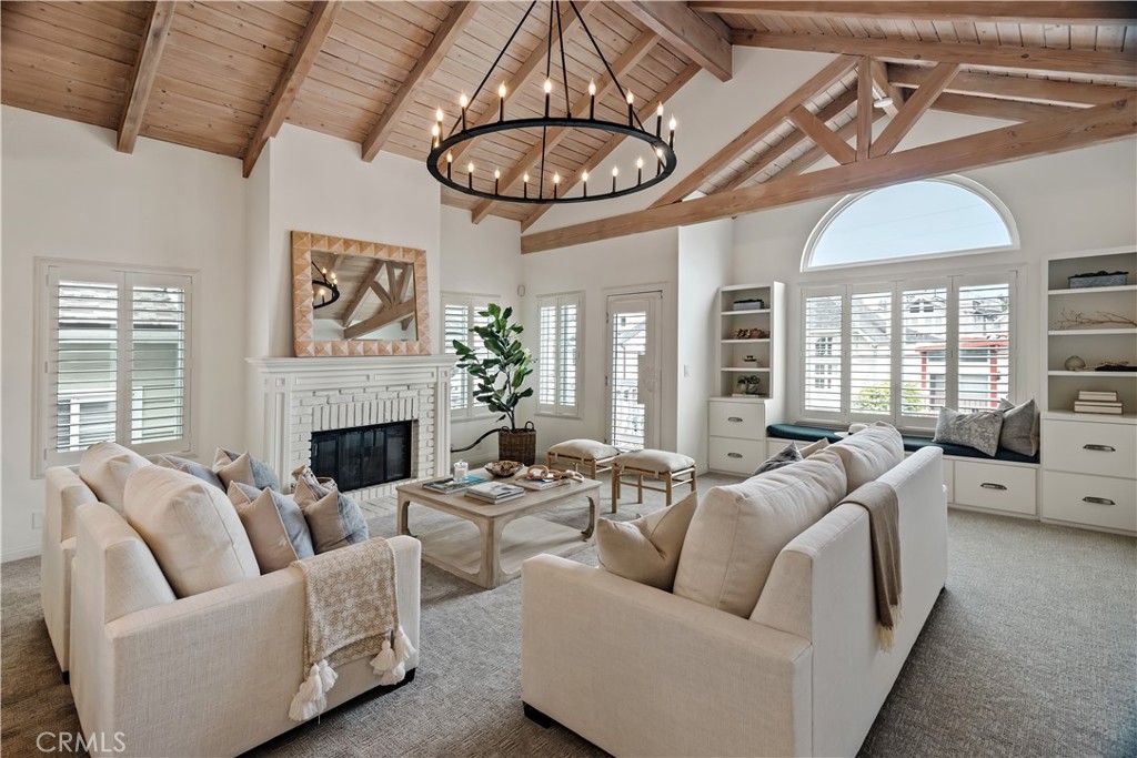 Located on one of the best streets and pockets within the Golden Hills neighborhood of Redondo Beach, this is your dream home central to just about everything! Award-winning schools are just a few blocks away. The beach, dog park, shopping, and dining are all close by. Mira Costa High School is just up the street.This gorgeous home, all freshly painted inside and out, is light and bright with central air conditioning, high vaulted ceilings, a gorgeous upgraded kitchen, wood floors, all upgraded bathrooms, brand new carpet throughout, a beautiful fireplace, upgraded lighting throughout, and a private backyard perfect for entertaining and dinner parties.The upgraded kitchen boasts tons of cabinets, marble countertops, and stainless steel appliances. A large primary suite has a spacious walk-in closet, gorgeous lighting, a private balcony, and an upgraded master bathroom with a soaking tub, marble shower, and double sinks. Two more bedrooms downstairs share an updated bathroom. If you’ve been waiting to find your perfect dream home, this is it! Arrange a private showing today, this is the one you've been waiting for!