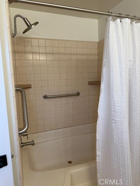 Bath tub and shower in primary bathroom