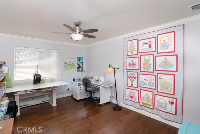 A spare bedroom currently used as a craft center.