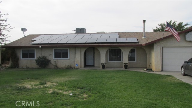 14528 Gravilla Road Victorville, California This beautiful well maintained Pool home in Victorville won't last. Large lot with RV access. New tile and carpet in most of the home. Nice bonus room with additional fireplace off kitchen. Wood burning stove in Living room for those cool cozy days. In ground pool and patio for the warm summer days. Come see!!!