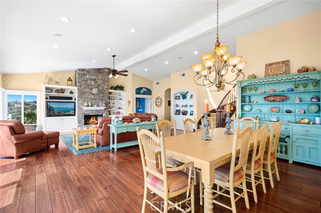 The open floorplan measures approximately 4,469 square feet and includes three ensuite bedrooms, and three- and one-half baths that shine with onyx countertops.