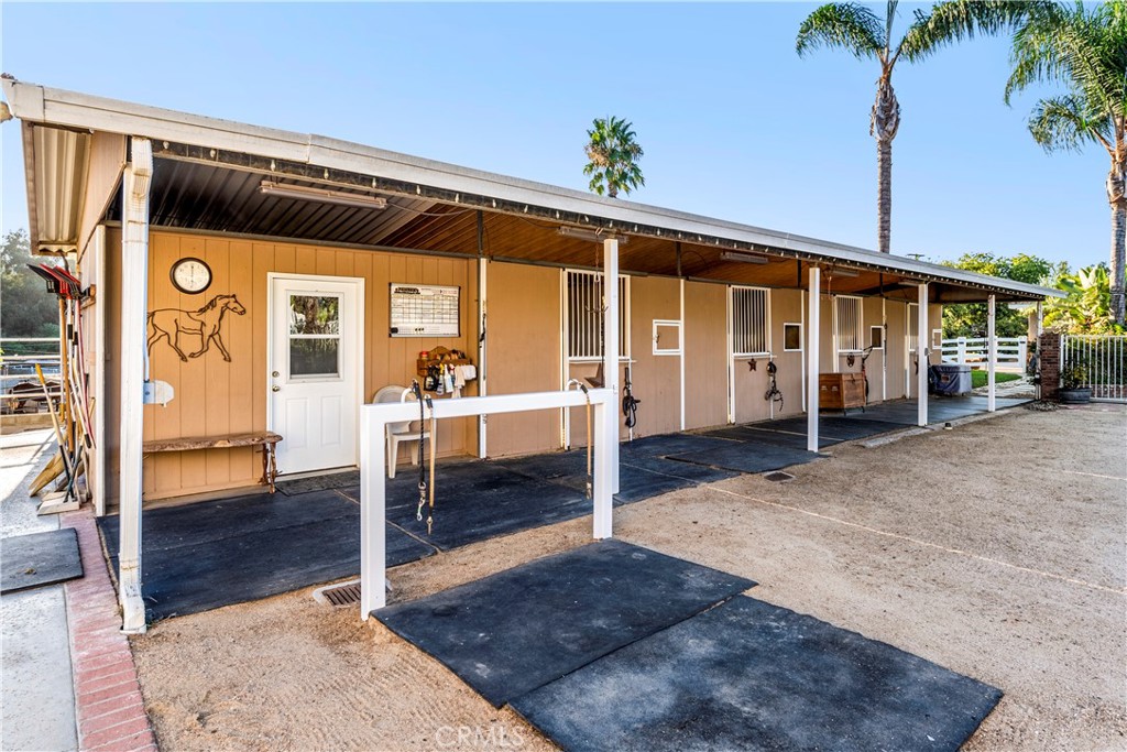 Heavy Duty Hitching post. Barn isle and stalls lined with rubber mats.