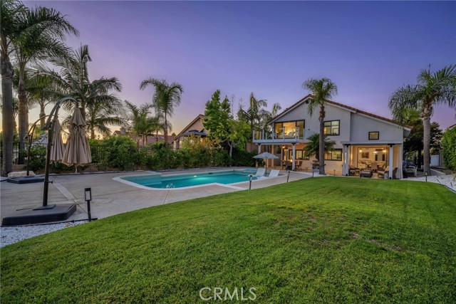 Welcome to your dream home! This stunning 5-bedroom, 3-bathroom modern luxury pool home is situated on a spacious 9,000 sqft lot, offering breathtaking canyon and city views. Completely reimagined with over $500,000 in upgrades, this property is the perfect blend of sophistication and comfort.

Step inside to discover an open-concept layout that radiates elegance, featuring high ceilings, custom lighting, and expansive windows that fill the home with natural light. The gourmet kitchen is a chef's delight, boasting top-of-the-line appliances, sleek cabinetry, and a large island—perfect for both casual meals and entertaining guests.

The luxurious primary suite is a true retreat, complete with a spa-like ensuite bathroom and a private balcony that offers serene views of the canyon. Four additional spacious bedrooms provide versatility, whether you need a guest room, a home office, or a space for family.

Outside, the beautifully designed backyard is an entertainer’s paradise. Relax by the sparkling pool, dine al fresco on the expansive patio, or simply enjoy the stunning sunsets over the canyon, out to the ocean and Catalina island. Lush landscaping and thoughtful hardscaping create a sense of privacy and tranquility.

With no detail overlooked in this fully upgraded property, this home offers the pinnacle of modern luxury living, all set against the backdrop of captivating views. Don't miss your opportunity to own this one-of-a-kind residence—schedule your private tour today!