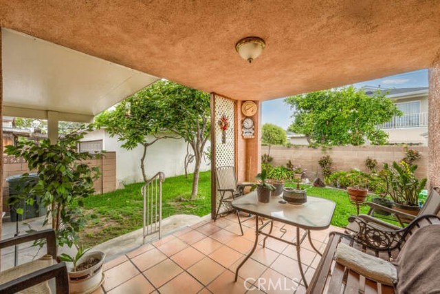 One of two patio areas in rear of home