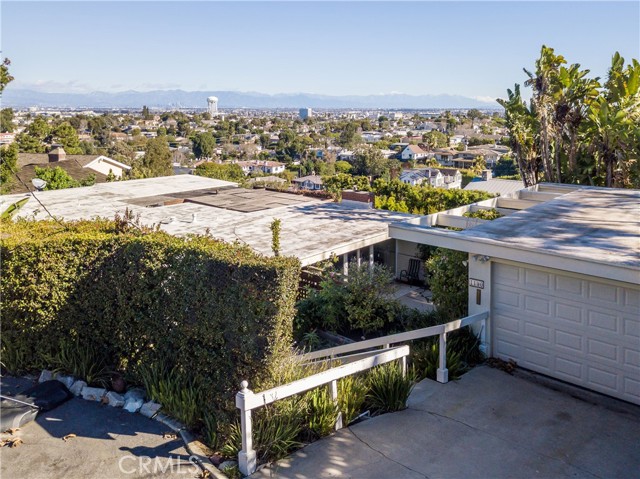 View of garage and roof of house