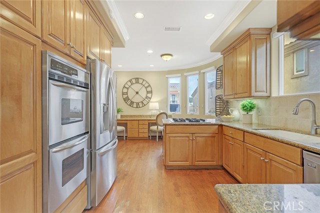 Spacious gourmet kitchen with stainless steel appliances