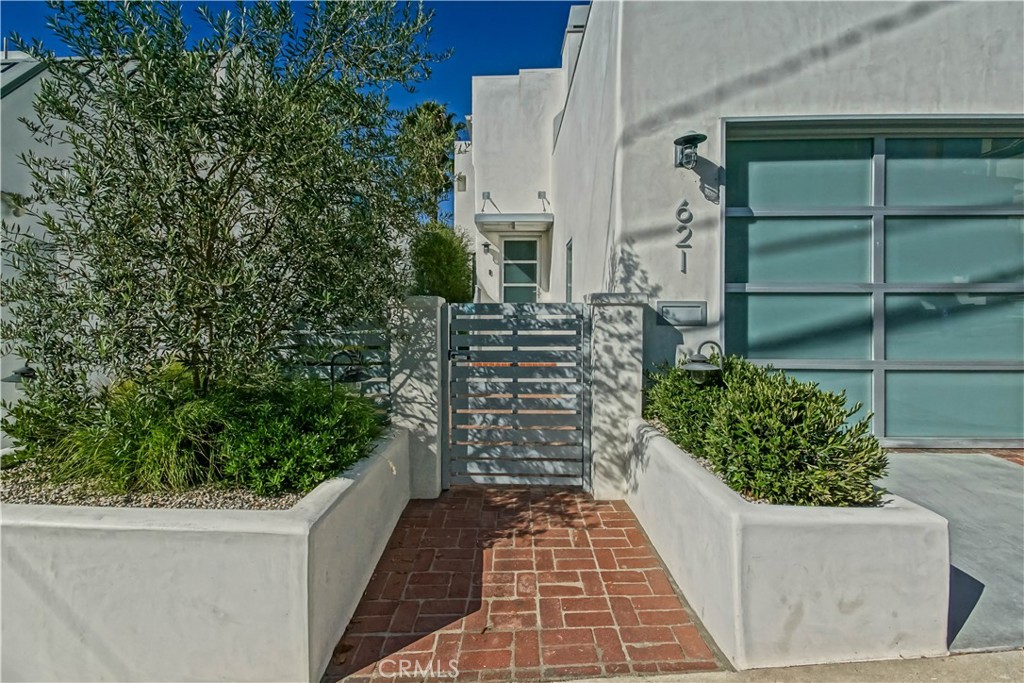 Entered for comparable sale purposes.  Gorgeous, extensively remodeled home in Manhattan Beach’s coveted American Martyrs neighborhood. This tastefully designed home features 3 bedrooms plus an office and a unique location above the greenbelt that lends both privacy and a feeling of “being above it all” with views of the Santa Monica mountains, sunsets and the Tree Section. Great walk-friendly location to downtown shops, restaurants, the pier and the beach.
