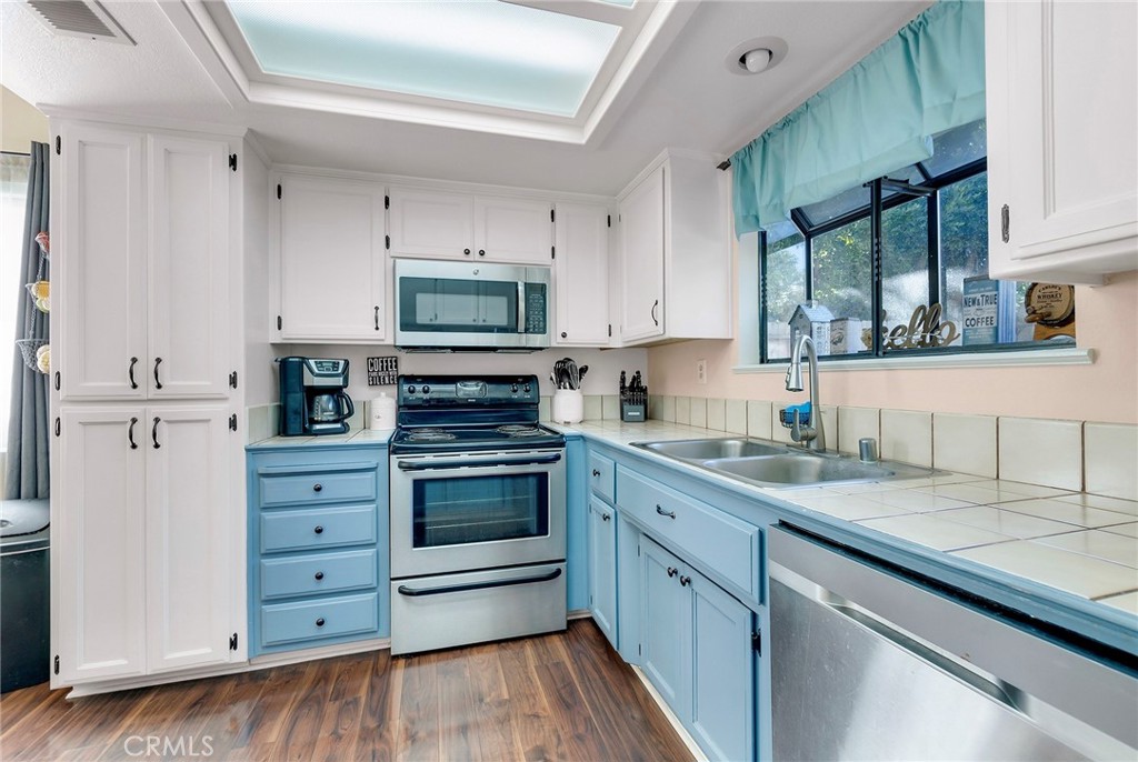 Kitchen with built-in microwave.