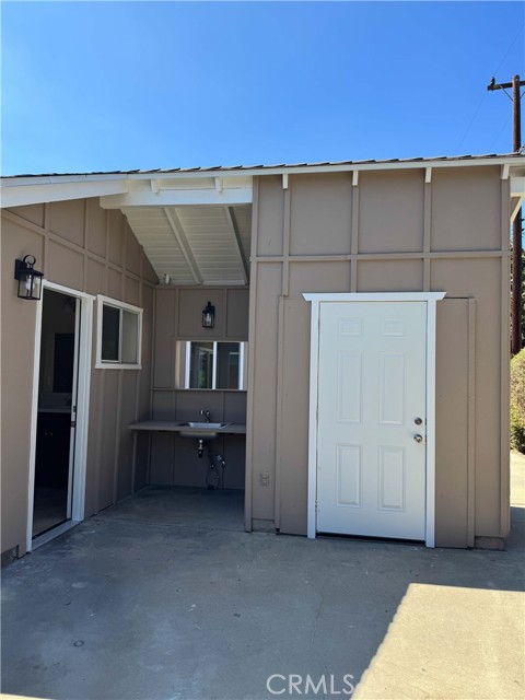 Storage shed and outdoor sink