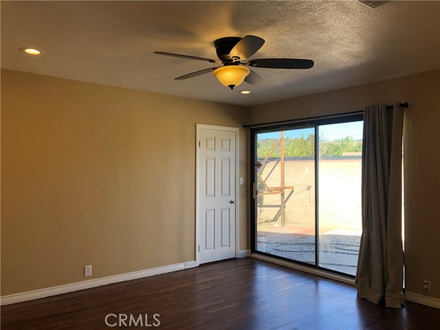 Primary Bedroom with sliding glass door