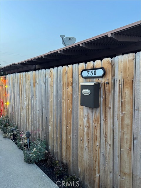 Private wood fence entry to the unit