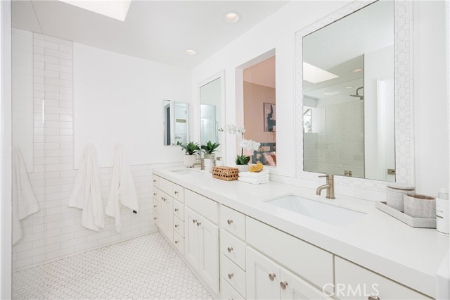 Master bathroom with dual sinks