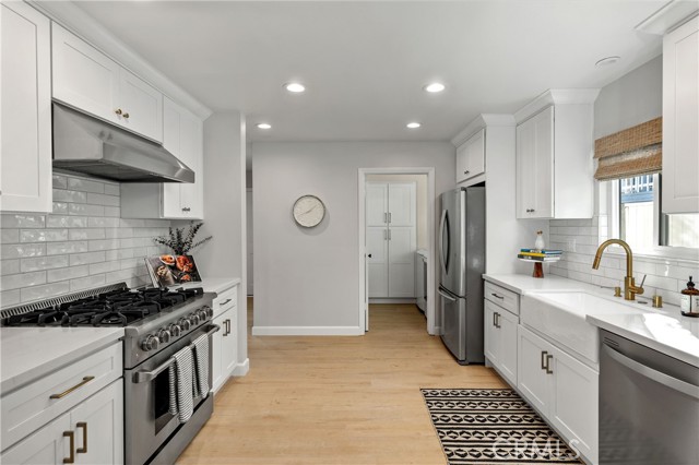 Kitchen: View towards Laundry Room and Pantry.