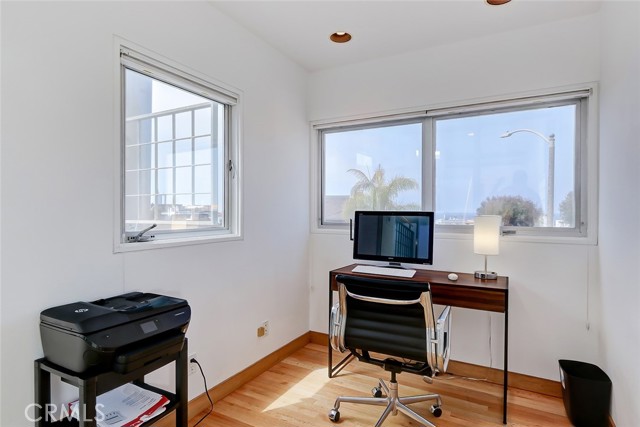 At the top of the stairs is this charming office niche with it's own ocean views - no need to ever leave!