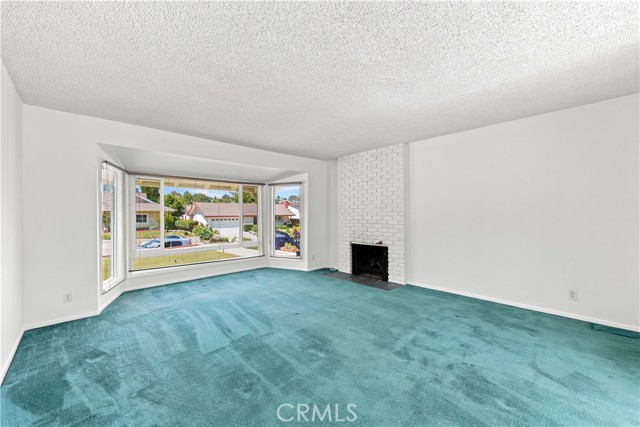 Open & bright & airy family room with fireplace Open & bright & airy family room with fireplace