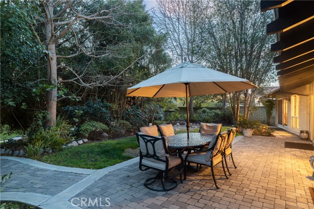 Enjoy the perfect Peninsula climate in the entertainer's backyard with grassy yard and patterned stone patio - ready for outdoor play, BBQ's, dinner parties, lounging, and relaxing with cool Palos Verdes days or under the gorgeous evening skies.