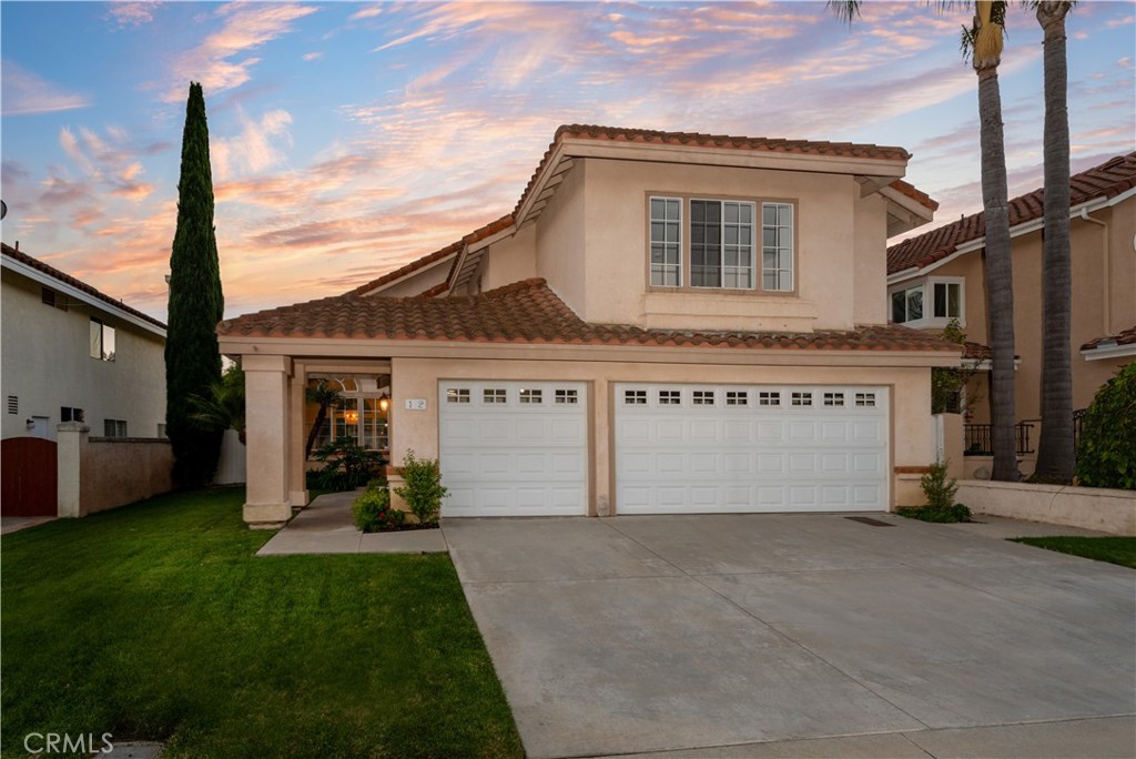 Live Auction! Bidding to start from $1,500,000! Welcome to 12 Seabridge Road, a beautifully updated five-bedroom, three-bath home in the heart of Laguna Niguel. This property offers an inviting open floor plan with abundant natural light and elegant finishes throughout. The spacious living area features vaulted ceilings and a cozy fireplace, seamlessly flowing into a modern kitchen equipped with high-end stainless steel appliances, ample storage, granite counters, an eat-in dining area, and a breakfast bar—perfect for entertaining. A curved wood staircase leads to four additional bedrooms upstairs. The primary suite is a luxurious retreat with a spa-like en suite bathroom, featuring a double vanity, separate inset bathtub, walk-in shower, and a walk-in closet. Additional highlights include a private backyard with lush landscaping, ideal for outdoor dining and relaxation. Nestled in a cul-de-sac location in The Westerlies, this home is adjacent to George White Elementary School, and near 16-acre Chapparosa Park with sports courts, fields, and picnic areas. Enjoy nearby Salt Creek Trail access, leading to Monarch Beach Golf Links, Waldorf Astoria, Salt Creek Beach, and the Ritz Carlton without crossing a street. This property presents an exceptional opportunity to enjoy the best of Laguna Niguel living—don’t miss the chance to make it yours!