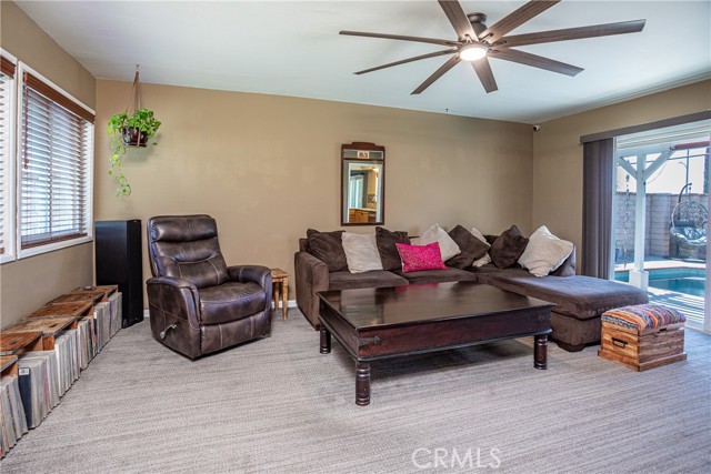 28209 Hot Springs, Comfortable Family Room with pool and patio view.