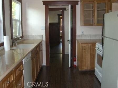 Galley kitchen off of dining room.